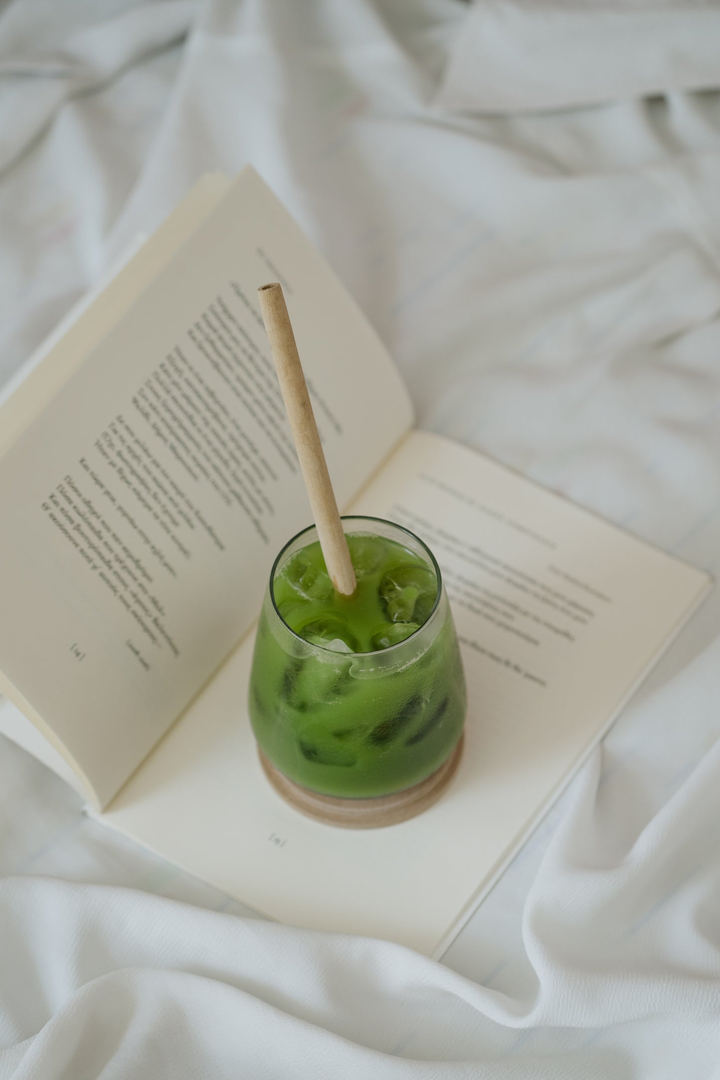 matcha latte on top of book